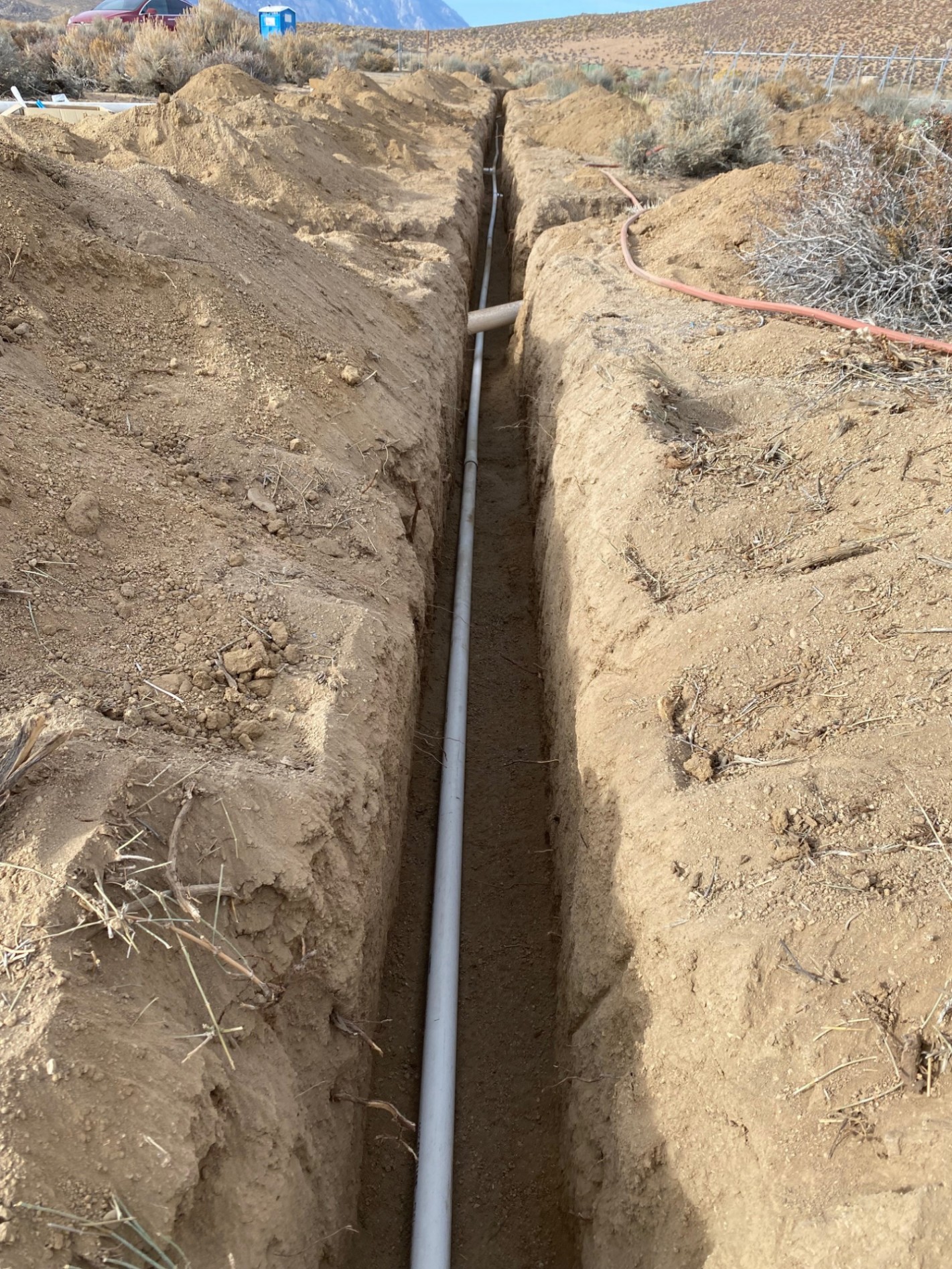 A trench with many intersections- all with pvc pipe