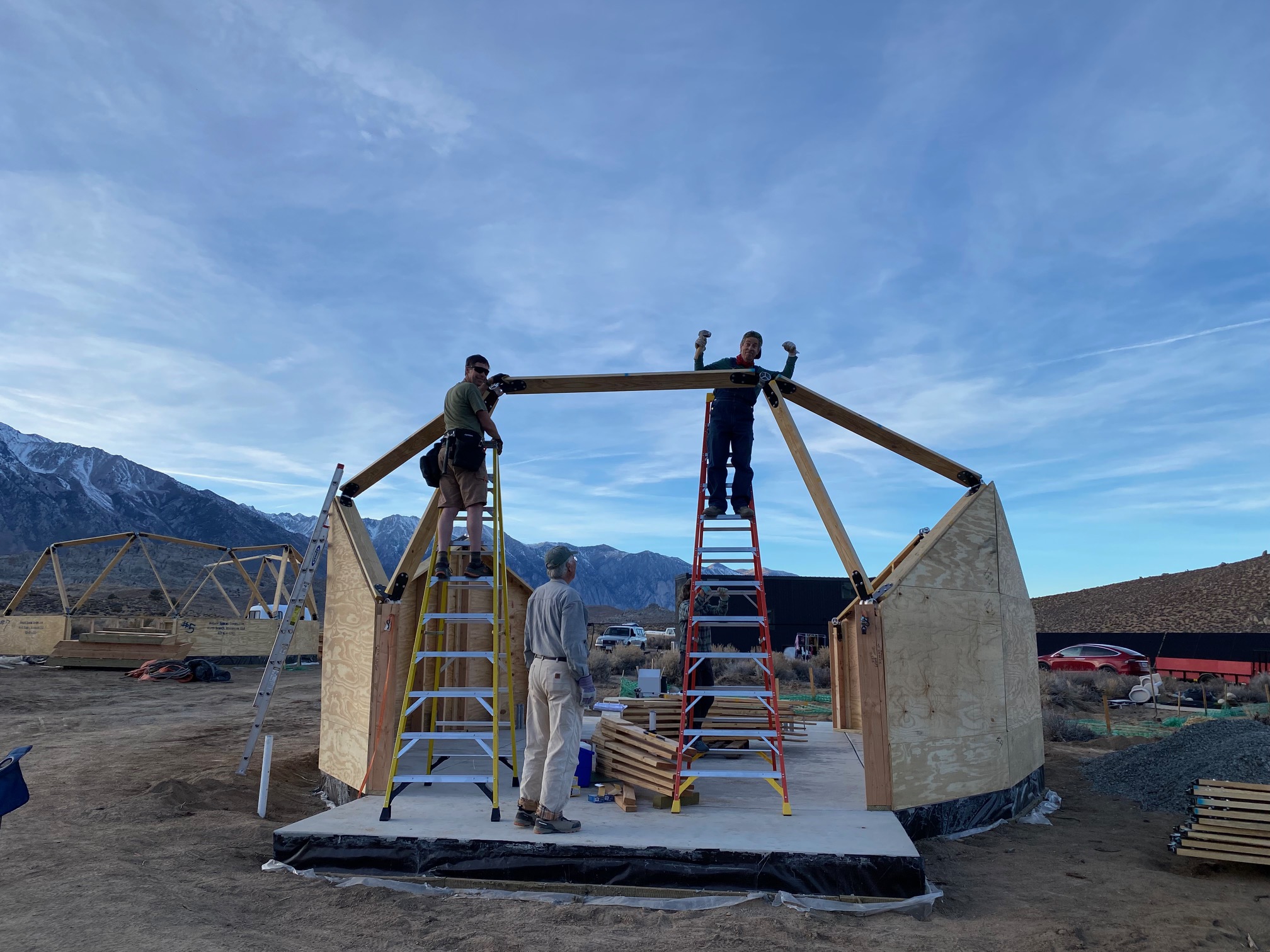 In a geodesic dome construction with 2 extension openings, the first strut spans the two sides.